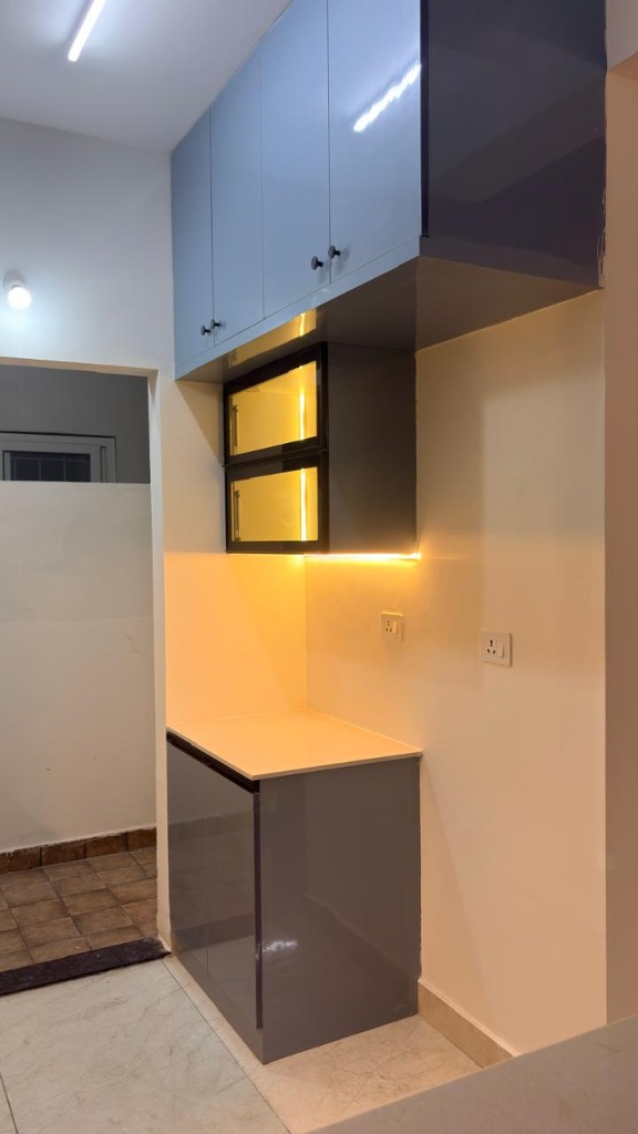 Modular Kitchen with Profile Lighting & Glass Cabinet